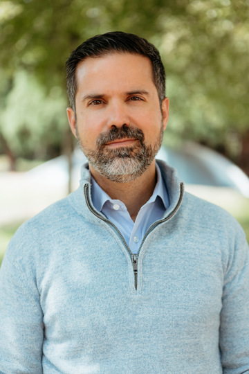 Headshot of Tiago Dorocha